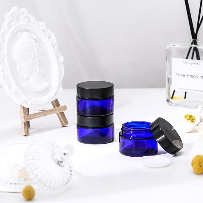 Domensi 60 Pcs 1oz Glass Jars with Lids Bulk Salve Tins Small Glass Candle Cosmetic Jars for Travel with Inner Liners Containers for Lotions Sample Cream(Cobalt Blue, Black Lid)