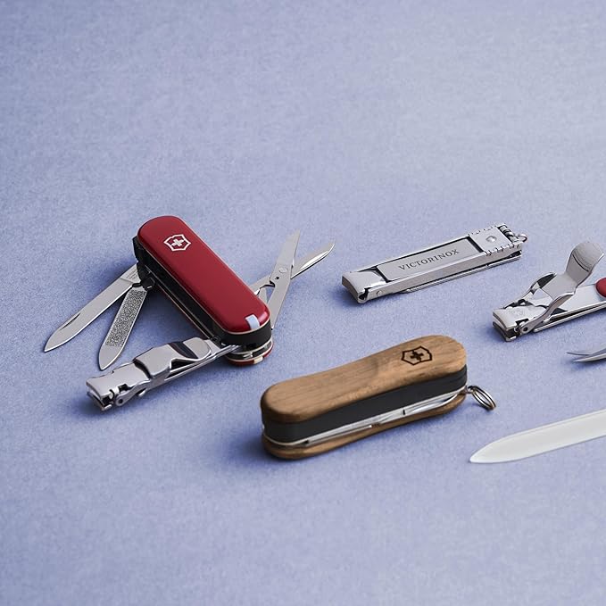Victorinox Nail Clip 580 Wood Swiss Army Knife, 6 Functions, Swiss Made Pocket Knife with Nail File, Nail Cleaner and Small Blade - Walnut