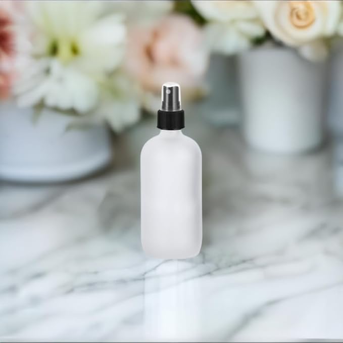 JUVITUS 2 oz Frosted Clear Glass Boston Round Bottle with Black Mist Spray (12 Pack) for Cosmetics, serums, Carrier and Essential Oils, Aromatherapy