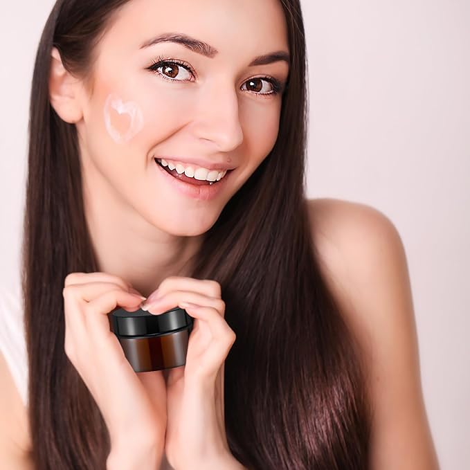 Domensi 60 Pcs 1oz Glass Jars with Lids Bulk Salve Tins Small Glass Candle Cosmetic Jars for Travel with Inner Liners Containers for Lotions Sample Cream(Amber, Black Lid)