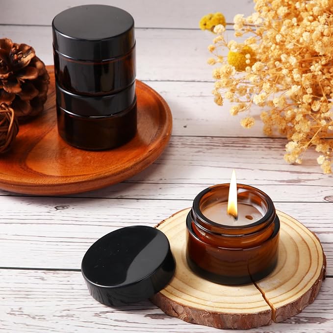 Domensi 60 Pcs 1oz Glass Jars with Lids Bulk Salve Tins Small Glass Candle Cosmetic Jars for Travel with Inner Liners Containers for Lotions Sample Cream(Amber, Black Lid)