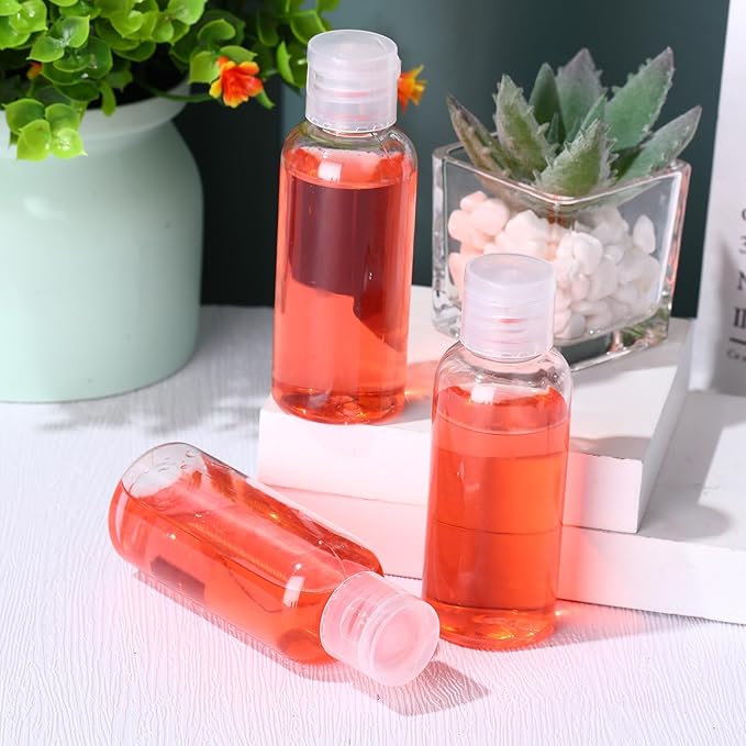 Zhehao 200 Pcs 2 oz Clear Plastic Empty Bottles Small Travel Size Bottles with Flip Cap Empty Transparent Dispenser Container for Liquids Toiletries Shampoo Lotion(Colorless Cap)