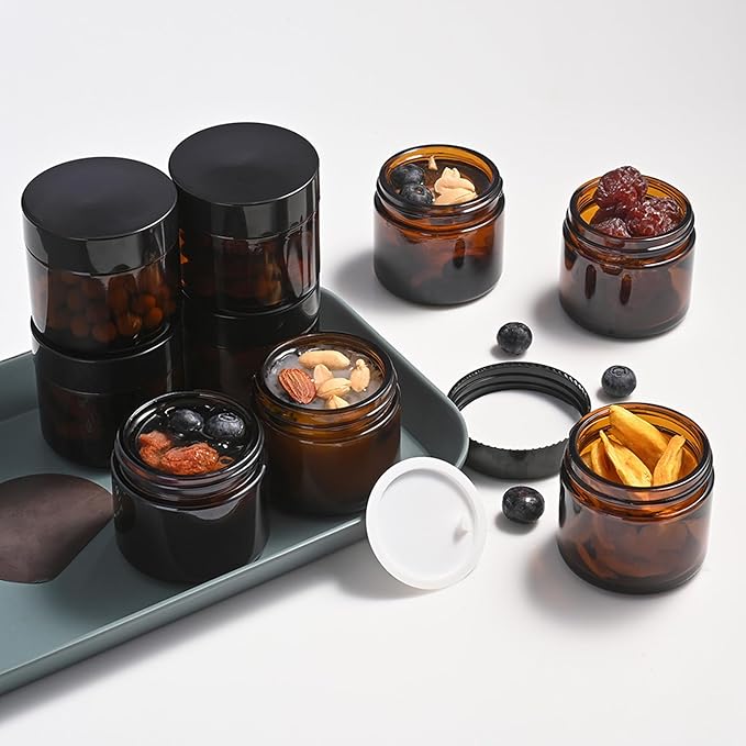 2 oz Glass Jars with Lids, 48 pack Round Small Containers with Black Lids, Blank Labels & Inner Liners, Empty Cosmetic Containers for Sample, Powder, Cream, Lotion Amber and Blue