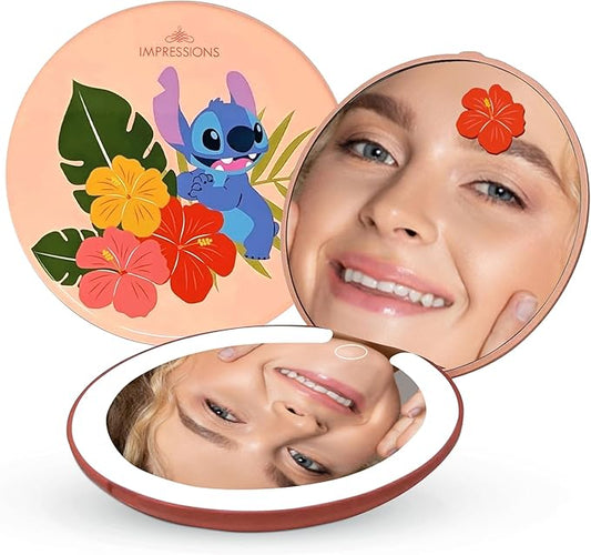 Impressions Vanity Disney Stitch Compact Mirror with Light, Double Sided Cute Travel Makeup Mirror with Magnification, Daylight LED Lighting, Adjustable Brightness, and Touch Control (Coral)
