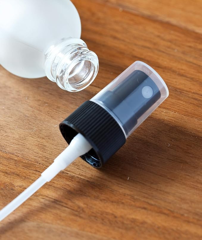 JUVITUS 2 oz Frosted Clear Glass Boston Round Bottle with Black Mist Spray (12 Pack) for Cosmetics, serums, Carrier and Essential Oils, Aromatherapy