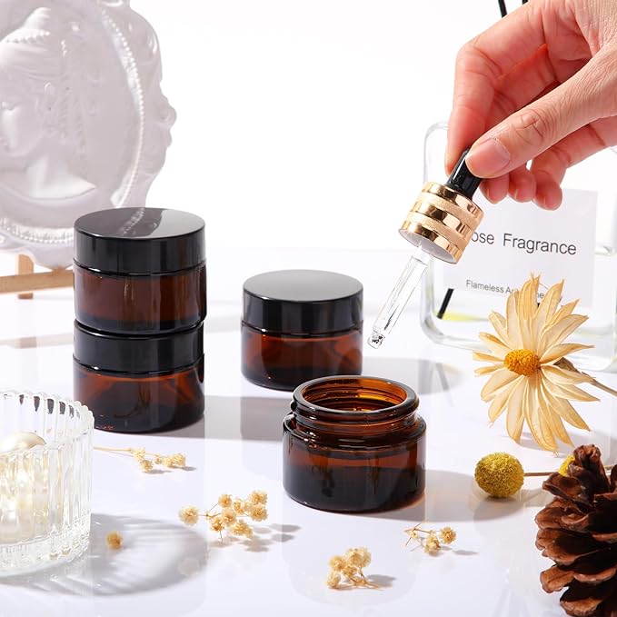 Domensi 60 Pcs 1oz Glass Jars with Lids Bulk Salve Tins Small Glass Candle Cosmetic Jars for Travel with Inner Liners Containers for Lotions Sample Cream(Amber, Black Lid)