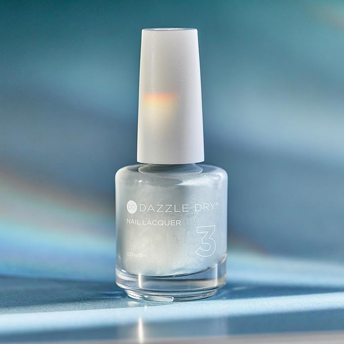 Dazzle Dry Nail Lacquer (Step 3) - Moonlight - A full coverage, pearlescent grey-toned blue. Full coverage cream. (0.5 fl oz)