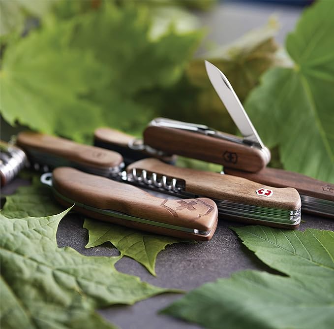 Victorinox Nail Clip 580 Wood Swiss Army Knife, 6 Functions, Swiss Made Pocket Knife with Nail File, Nail Cleaner and Small Blade - Walnut